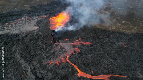 Aerial view of flaming lava crater and fire fountains at Litli-Hrutur eruption, Iceland 2023