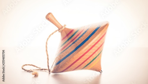 traditional wooden spinning top toy