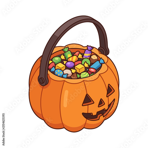 Pumpkin bucket filled with Halloween candy rests on a white background.