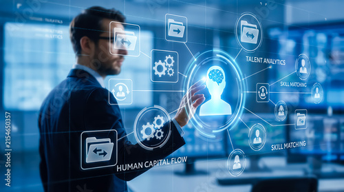 Businessman interacting with a futuristic digital interface representing human capital management, talent analytics, and skill matching technology