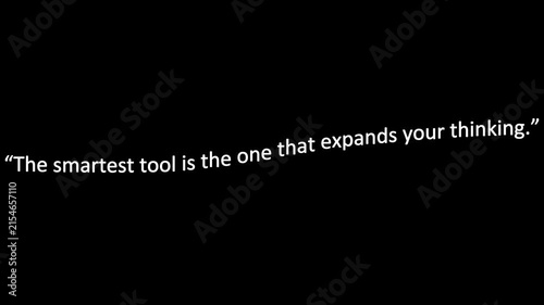 Text inspirational quote displayed on a dark background highlighting how smart tools expand human thinking and intellect.