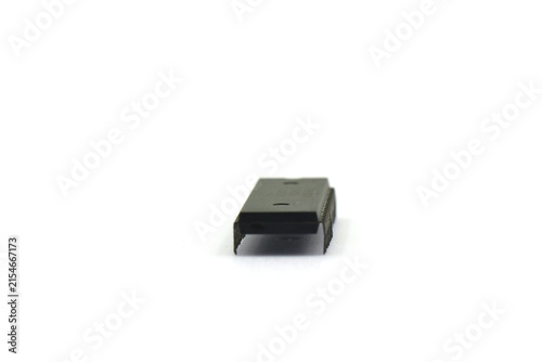 A blurry microcontroller on a white background. An archaic concept of technological advancement.