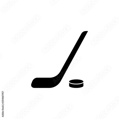 Dynamic black ice hockey stick and puck vector icon representing winter sport equipment championship design illustration