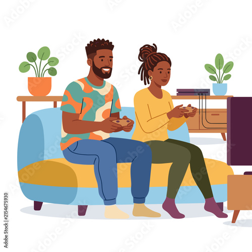 African American couple playing video games on couch  