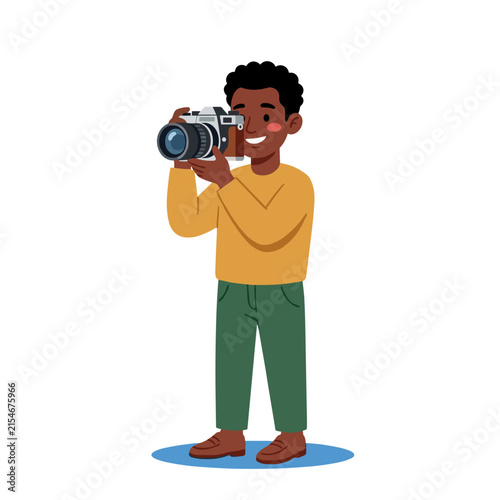 African American man taking photo with vintage camera  