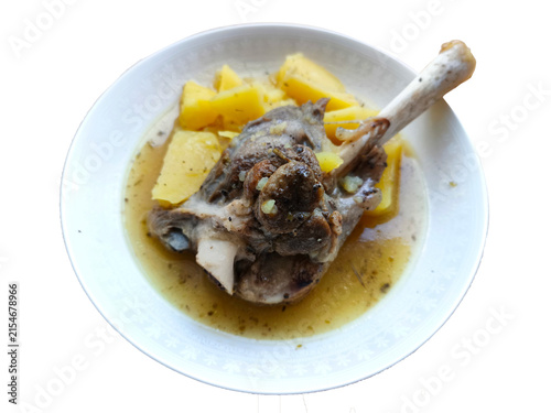 Canvastavla Grilled lamb chops served on a plate with potatoes and fresh salad; a delicious,