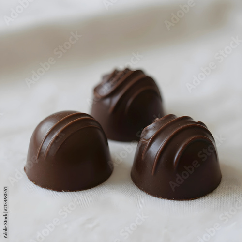 Three dark chocolate truffl...