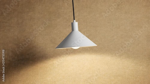 Modern white pendant lamp against textured beige wall.