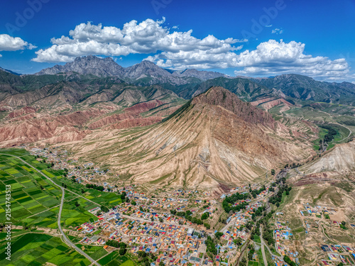 Aerial View of Mountain Village and Farmland in Qilian Mountain National Park, China
