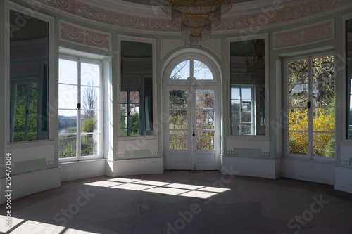 View through a window into the interior of a old pavilion