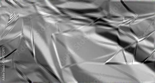 Silver crumpled foil texture creates an abstract metallic background with reflective highlights, dark shadows, and folded surface patterns.