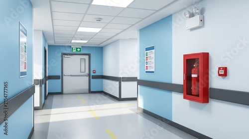 Hospital hallway with emergency exit signage and fire equipment