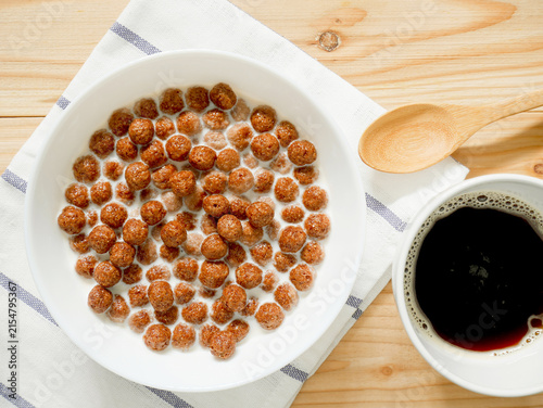 Chocolate cereal balls with milk