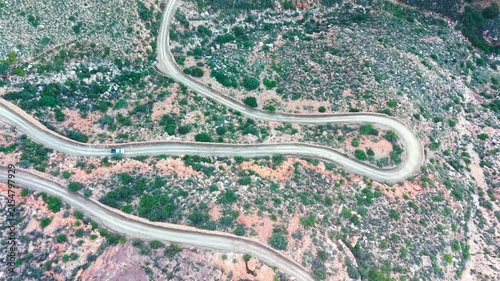 Aerial of winding dirt road mountain pass, Swartberg pass, South Africa