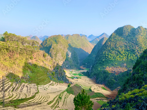 Karst Peaks Framing a Terraced Farming Valley in Vietnam