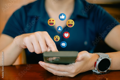 Social Distancing ,Working From Home concept..The concept of living on vacation and playing social media. Social media and digital online concept, man using smart phone with Social media..
