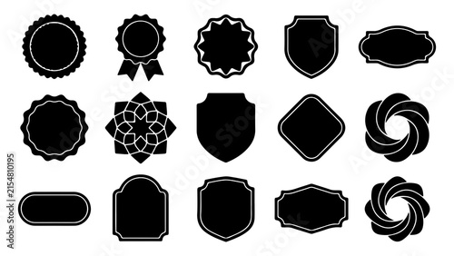 A comprehensive collection of fifteen unique black silhouette label and badge shapes isolated on a white background for graphic design projects