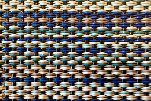 Canvas Print Woven mat featuring interlaced threads in earthy tones and striped patterns, hig
