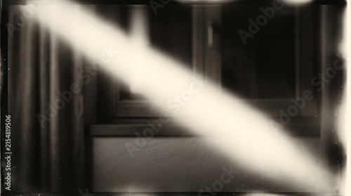 Abstract light beam streaming through dark corridor with soft blur and moody atmosphere