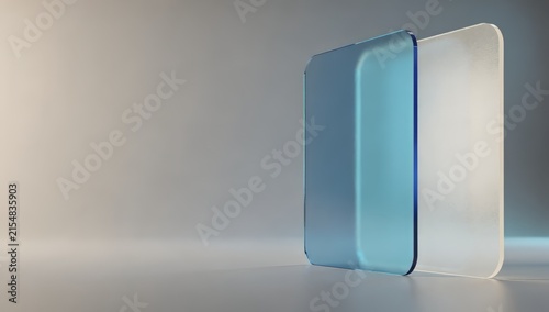 Two frosted translucent rectangular blocks one blue and one white with rounded edges on a reflective grey surface keywords: abstract, blue, white, frosted, translucent