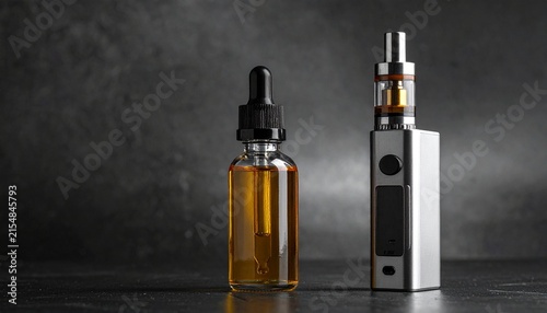 Electronic cigarette device with a glass dropper bottle containing golden vaping liquid placed on a dark surface for professional marketing.