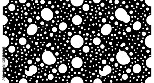 Playful Irregular Black and White Polka Dot Seamless Vector Pattern for Textile Design