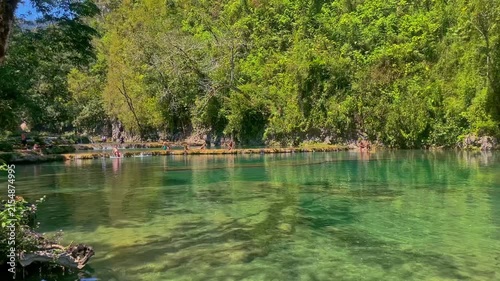 People playing in water at Semuc Champey Guatemala 