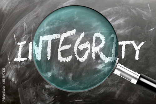 Obraz na płótnie Integrity - learn, study and inspect it. Taking a closer look at integrity. A magnifying glass enlarging word 'integrity' written on a blackboard ,3d illustration