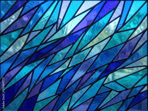 Abstract Blue and Sapphire Stained Glass Mosaic Backgrounds Set with Geometric and Wave Patterns