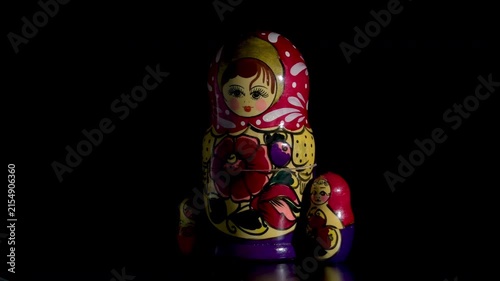 Conceptual close-up of a traditional spinning Matryoshka Russian nesting doll
