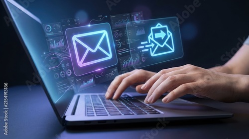 Person typing email on modern laptop with envelope icons