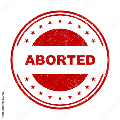 Fotografie Red round rubber stamp with the word aborted and a distressed grunge texture iso