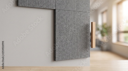 Modern gray acoustic panels on a wall in a bright interior space  