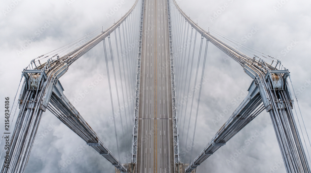 Fototapeta premium Overhead Symmetrical Suspension Bridge Roadway