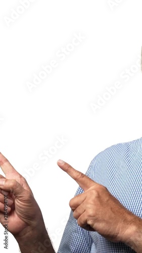 Indian Asian senior businessman with a white beard pointing both hands with a playful smile, enjoying  a moment of lighthearted mischief and fun 