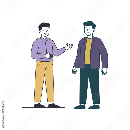 Two young male colleagues standing and having a friendly conversation while discussing work projects in a modern professional office environment during the business day