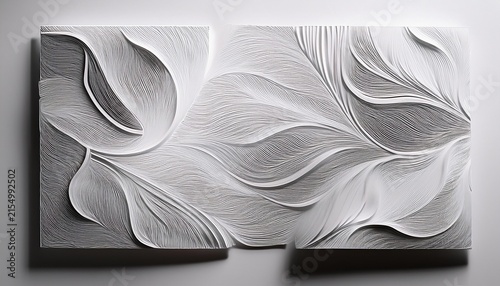 monochrome embossed paper cards with subtle abstract relief on white surface