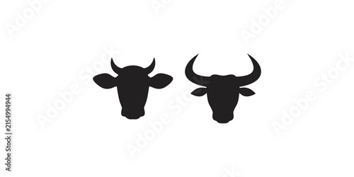 Two bull head silhouettes in black on a transparent background illustrating livestock and farm animals.