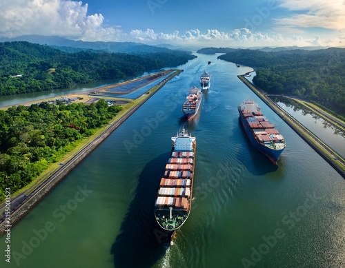 aerial view of cargo ships navigating the panama canal panama canal cargo ships shipping