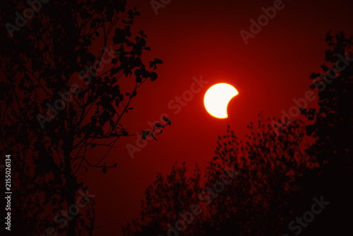 Partial solar eclipse in 2026 at the city of Zagreb, Croatia when moon covered part of the sun at sunset