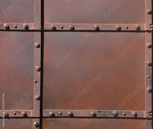 Fotografía rusty, weathered rust-eaten metal iron background backdrop panel with rivets