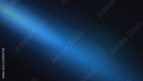 A soft blue diagonal beam of light shining from the left corner across a dark black background, with a fine, grainy texture and, a subtle glow effect