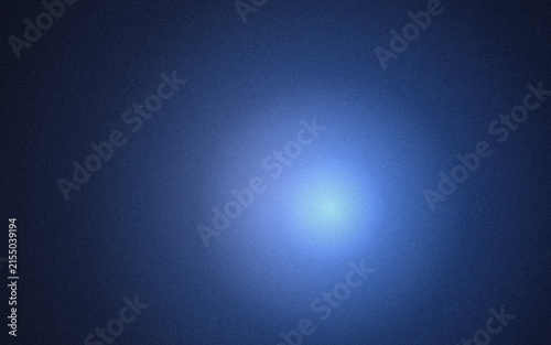 Soft glowing blue light spot positioned off-center on a dark, grainy, and textured background, with a subtle, radial gradient and, deep shadows