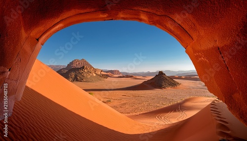 desert landscape viewed through terracotta architectural opening