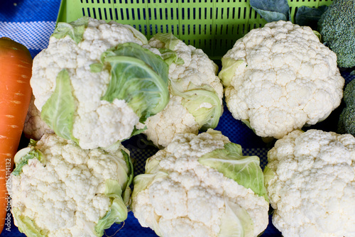 Fresh cauliflower heads at a local market stall