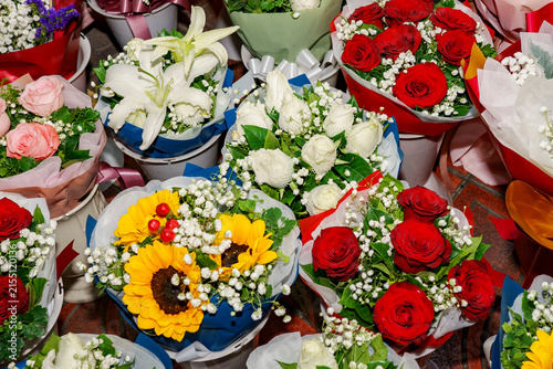 Canvastavla Rolls of bouquets with many kinds of flowers at Pak Khlong Talat (Flower Market)
