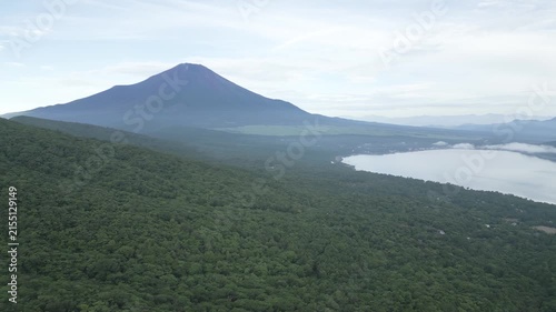 Aerial drone footage of Mount Fuji and lake Yamanaka on a summer morning, Yamanashi