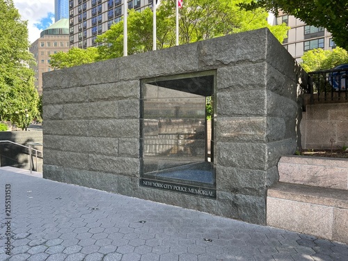 New York City, New York, USA - March 24, 2025: The stone wall monument at the New York City Police Memorial in Battery Park City, Manhattan, honoring fallen NYPD officers.