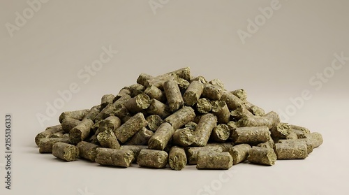 A close up studio shot of a pile of organic alfalfa pellet used for animal feed, highlighting the textured green forage in a sustainable agriculture
