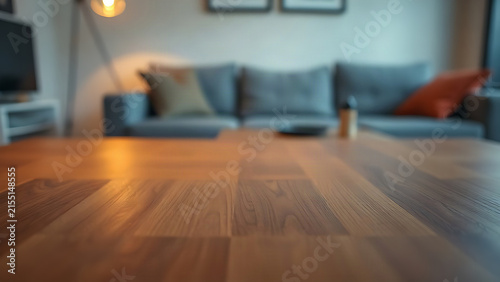 A minimalist wooden table with subtle grain texture, offering a clean and warm composition.